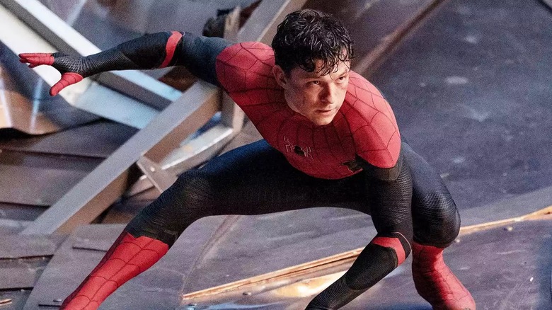 Peter Parker crouching in Spider-Man: No Way Home (2021)