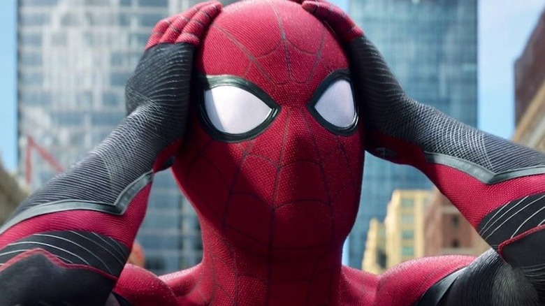 Spider-Man grabbing head