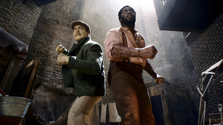 Flint Marko and Lonni Lincoln with fists raised on Spider-Noir