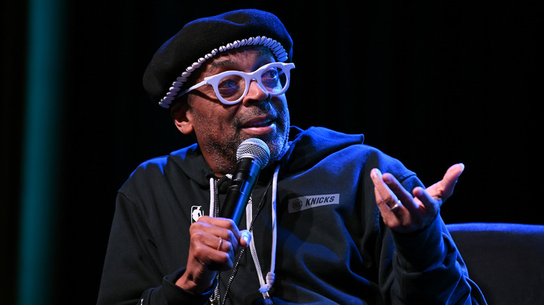 Spike Lee speaking into microphone