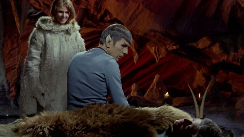 Zarabeth and Spock watching over a sleeping McCoy on Star Trek: The Original Series