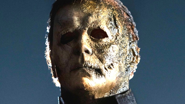 Michael Myers stands in his burned mask in close-up
