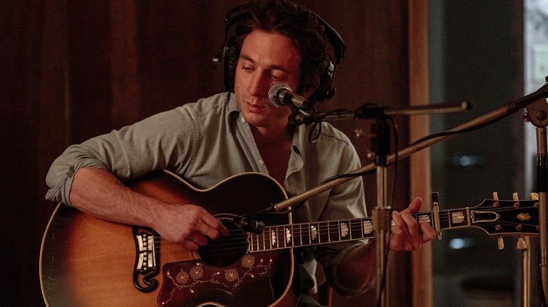 Bruce Springsteen playing guitar in studio in Springsteen: Deliver Me From Nowhere