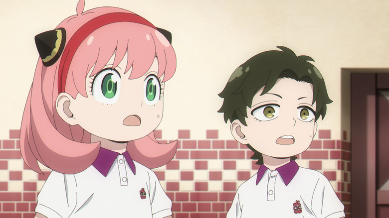 Anya and Damian stare in shock 