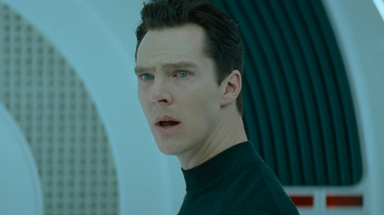 Khan looking over his shoulder