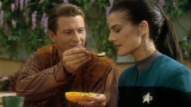 Deral feeding fruit to Jadzia Dax on Star Trek: Deep Space Nine