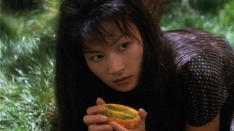 Adult Molly O'Brien holding a cup on Star Trek: Deep Space Nine