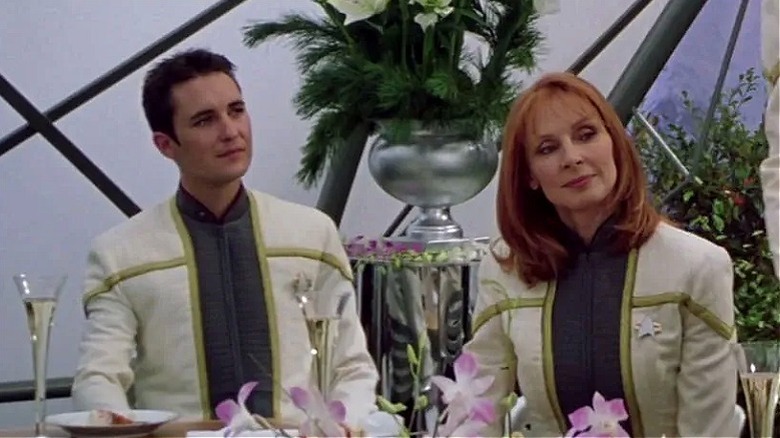 Wesley Crusher sitting next to Beverly Crusher at wedding in Star Trek: Nemesis