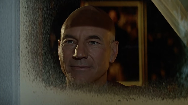 Picard looks through a frosted window