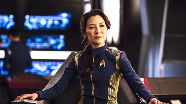 Captain Philippa Georgiou sits in the captain's chair of the USS Shenzhou