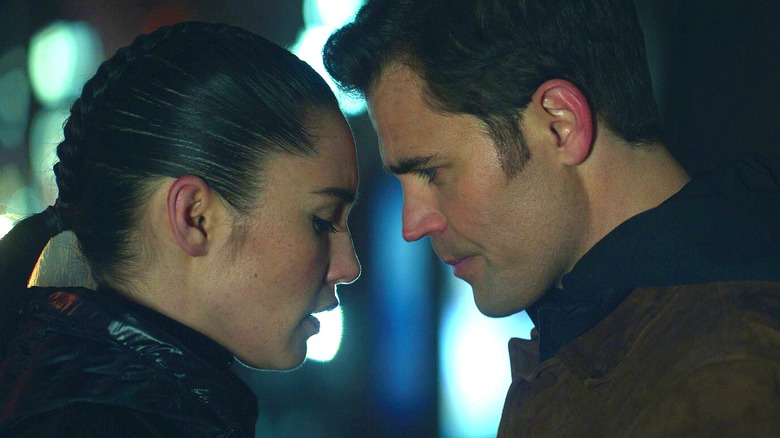 Kirk and La'an standing close in Strange New Worlds