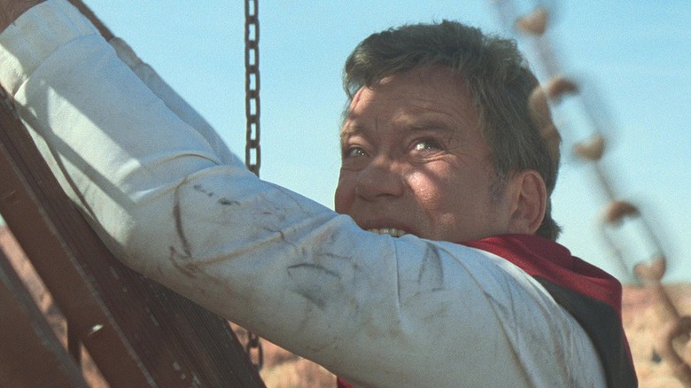 Kirk hanging from a platform in Star Trek: Generations