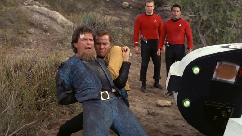 Captain Kirk drags Lazarus to his timeship in "The Alternative Factor" (1967)