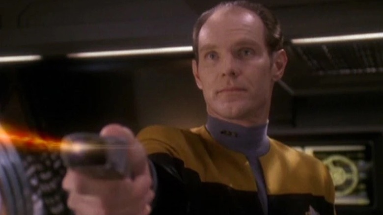 Eddington fires a phaser in Star Trek: Deep Space Nine