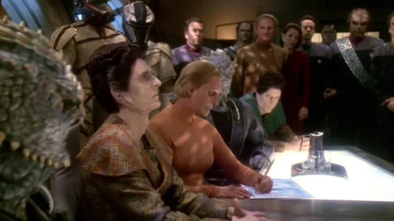 Representatives of the Dominion signing a peace treaty on "Star Trek: Deep Space Nine"