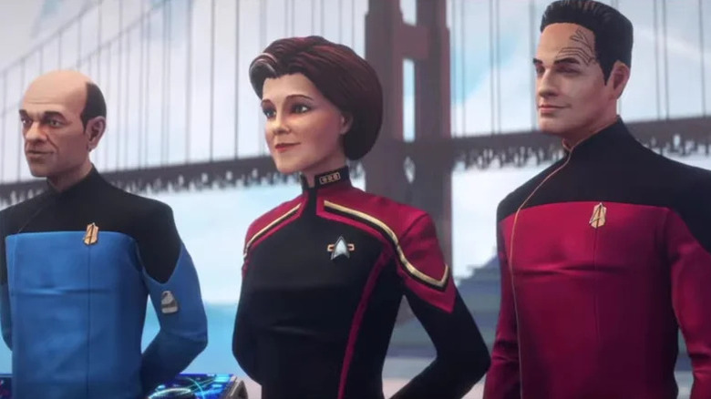 The Doctor, Janeway, and Chakotay standing in front of a bridge on "Star Trek: Prodigy"