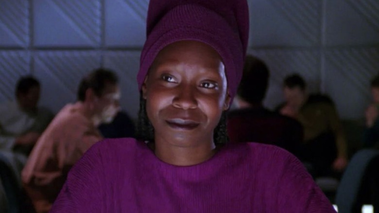 Guinan smiling and wearing purple on "Star Trek: The Next Generation"