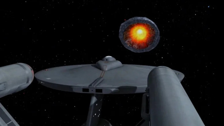 USS Enterprise facing the Planet Killer on "Star Trek: The Original Series"
