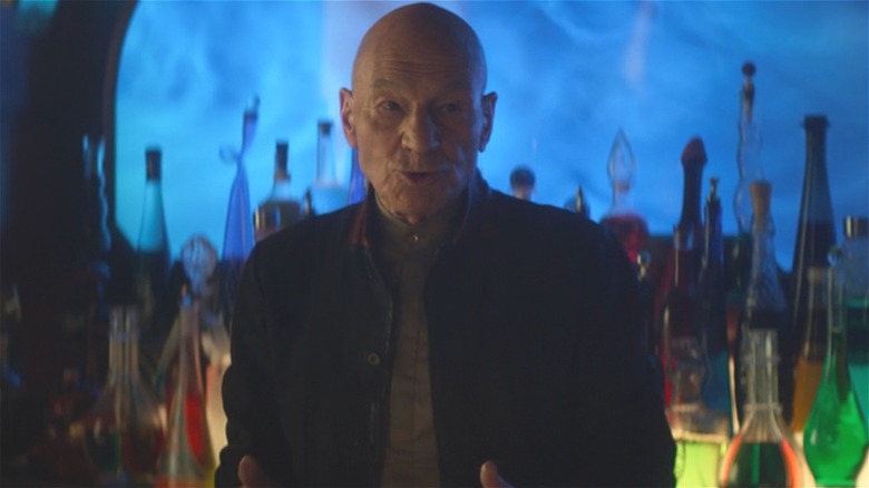 Picard speaking at a bar