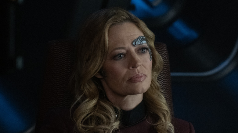 Seven of Nine sitting in a chair