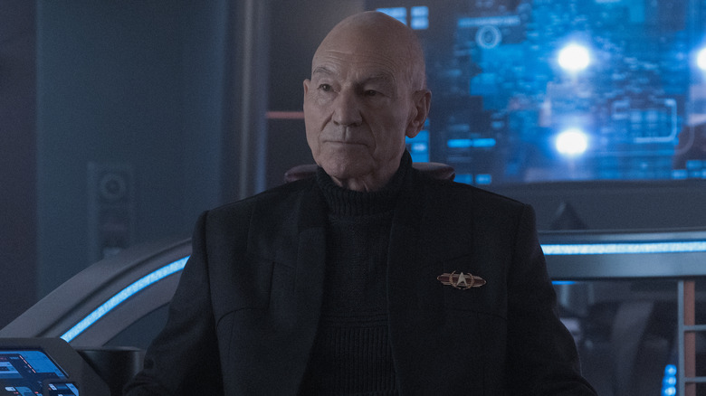 Jean-Luc Picard wearing black swearer and coat