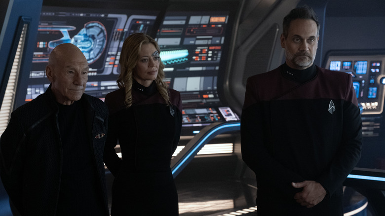 Picard, Seven of Nine and Shaw standing