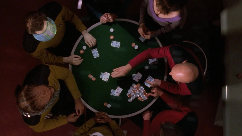 Jean-Luc Picard playing poker with his crew in Star Trek: The Next Generation