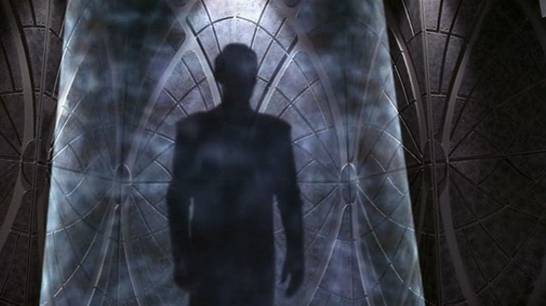 Silhouette of Future Guy talking to the Suliban