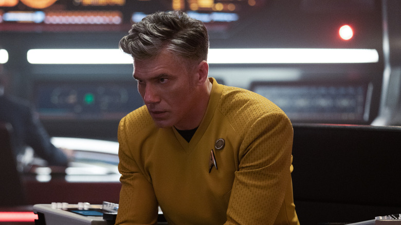 Captain Pike staring yellow shirt