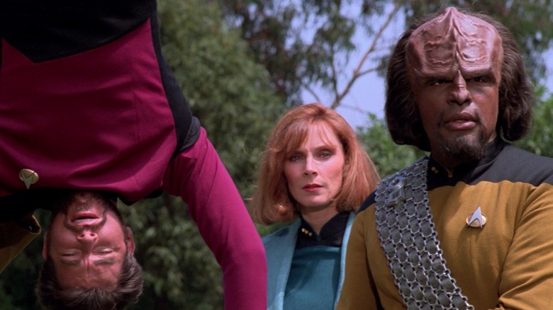 Riker, Crusher, and Worf on a planet in "Star Trek: The Next Generation"