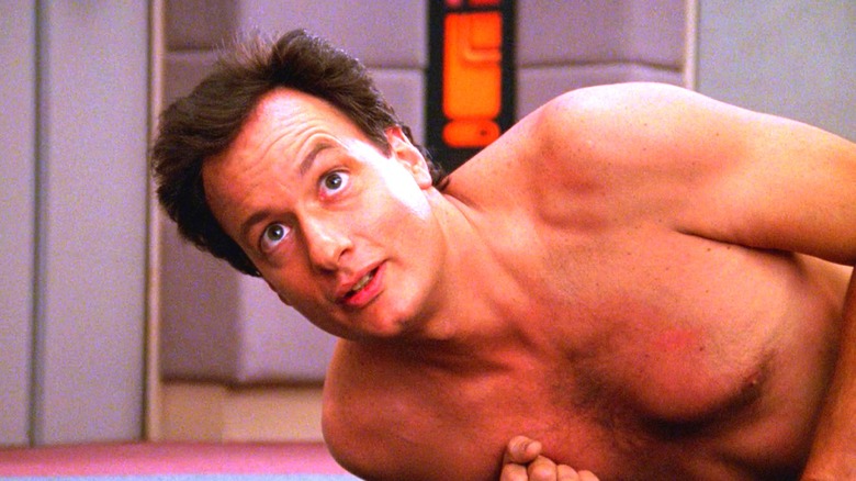 A shirtless Q in "Star Trek: The Next Generation"