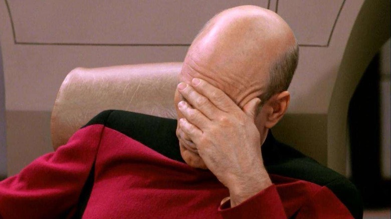 Picard with hand over eyes