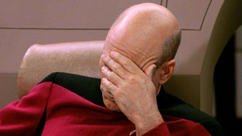 Picard with hand over eyes