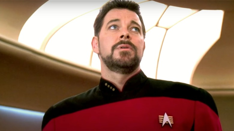 Commander Riker guiding the Enterprise