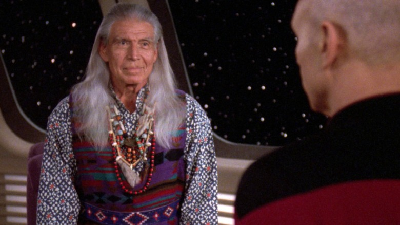 colonist leader looking at Picard