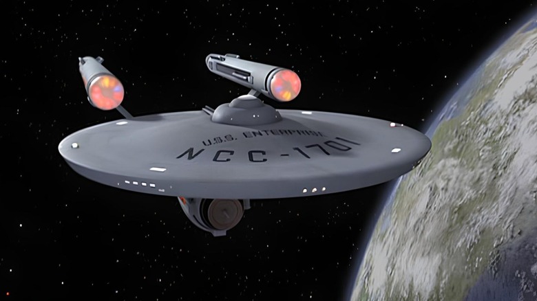 USS Enterprise traveling through space