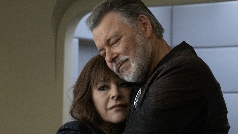 Deanna and Riker embracing