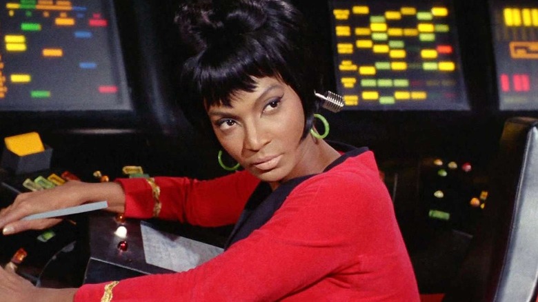 Uhura sits at her console on the Enterprise in "Star Trek" (1966-1969)