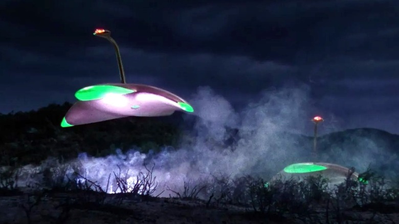 Two Martian war machines fly over a field in The War of the Worlds (1953)