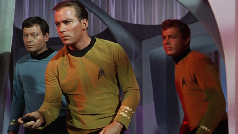 Lt. Cdr. McCoy, Captain Kirk, and an unnamed Lieutenant in Star Trek