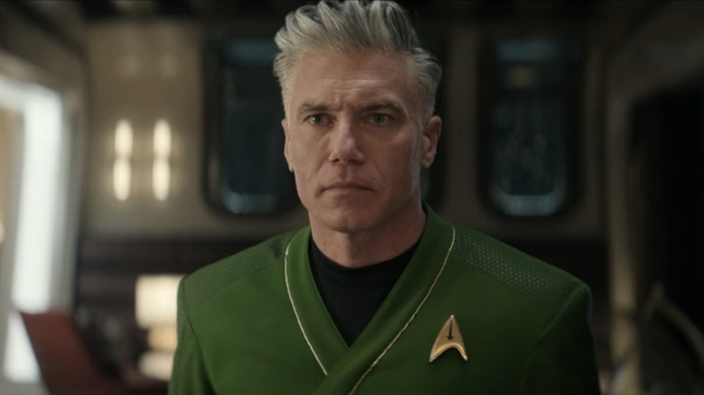 Pike in a green uniform in Star Trek: Strange New Worlds