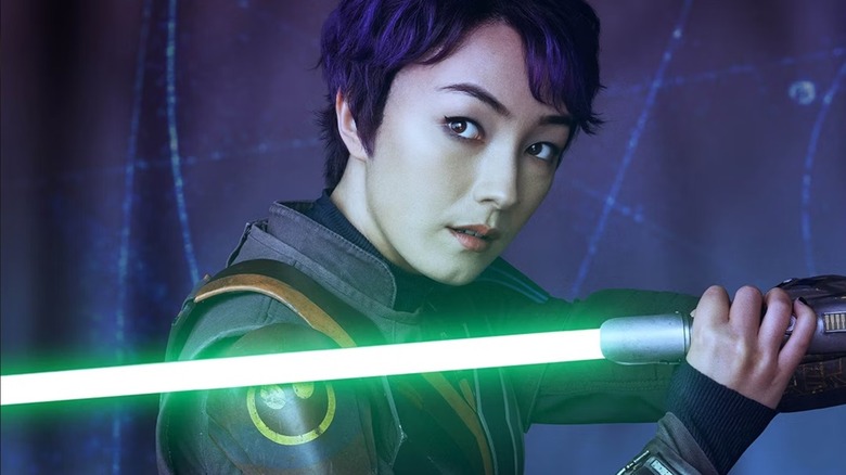 Sabine Wren holding a lightsaber on a poster for 