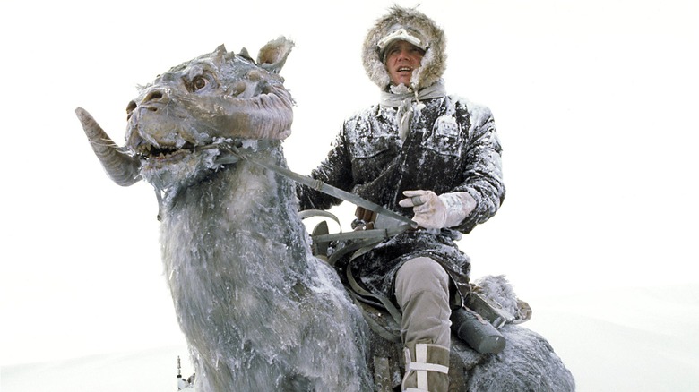 Han Solo riding a snow-covered tauntaun on Hoth