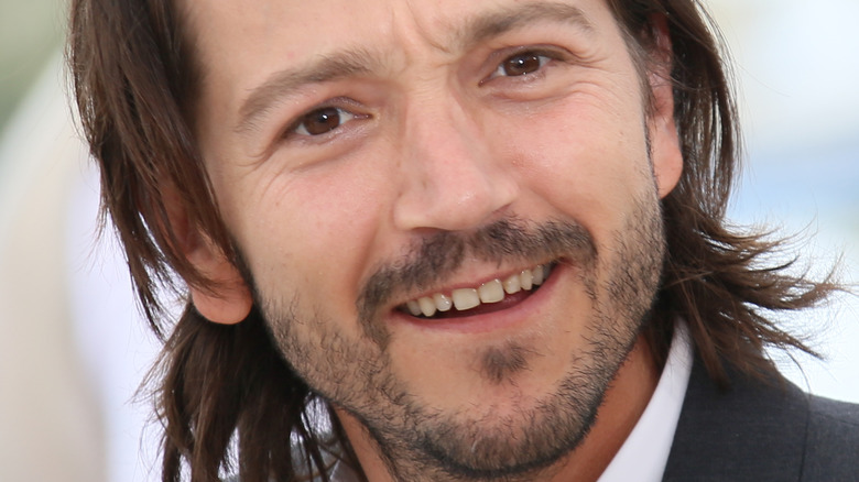 Diego Luna at event smiling