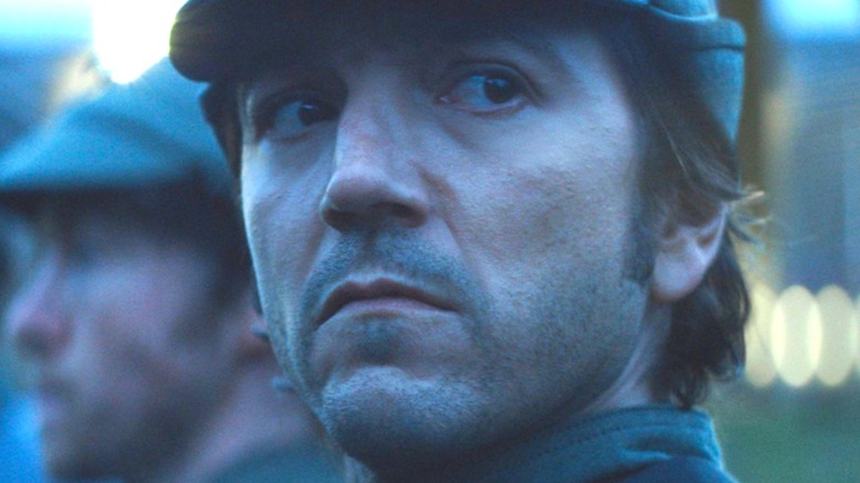 Diego Luna looking over his shoulder