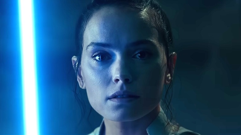 Rey gripping her lightsaber in Star Wars: Episode 9 - Rise of Skywalker