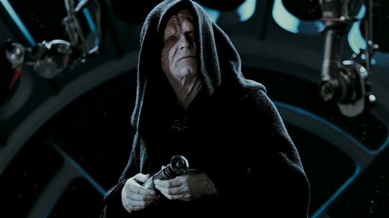 Darth Sidious holding light saber looking sideways in "Star Wars: Episode VI - Return of the Jedi"