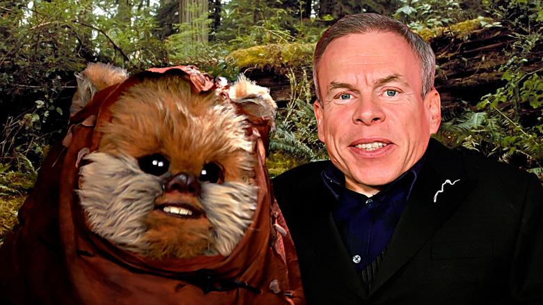 Ewock and Warwick Davis smiling