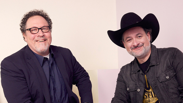 Jon Favreau and Dave Filoni smiling