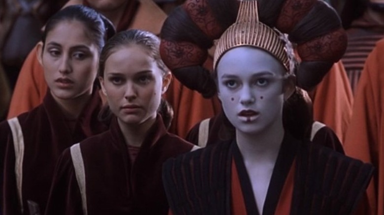 Amidala stands next to Sabé